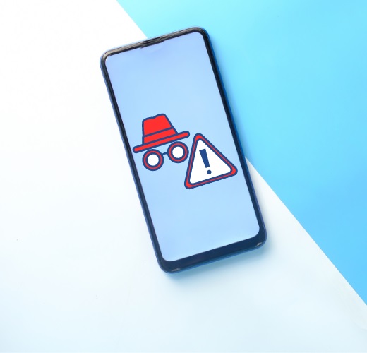 Image of smartphone with an alert sign on the screen.